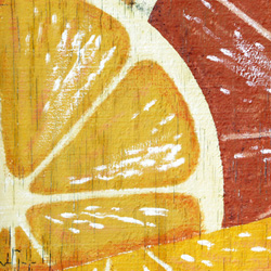 painted oranges on cracked wood